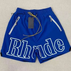 Moda Rhude Shorts Projektanci Męscy Koszykówka Krótkie spodnie Koszulka S Summer Beach Letter Mesh Street Fashion Spress Mashury Trend Marka Rhude White Fox Sweter 7739