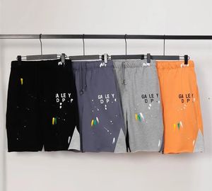 Nya män fläckiga bläck shorts bokstavstryck med dragkroppar design shorts mångsidiga avslappnade gallerier fast färgshorts för män och kvinnliga depts lös sport capris