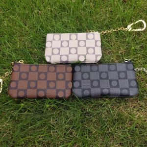 Desginer key wallet 2024 Womens men card holder small zippy wallets keycoin purse Brown fower Zippy coin Key Purse Coin Pocket Embossed CardHolder Holder KeyPouch