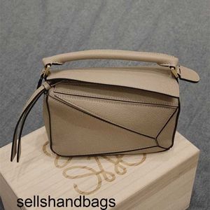 デザイナーロウズ国内パズル幾何学的汎用折りたたみバッグスプライスされた牛革女性小型ハンドバッグCy