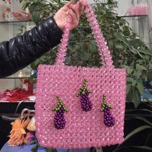 Kvällspåsar mode ins personliga mångsidiga kvinnors handväska rosa lila vegetabiliska aubergine dekorativ handvävd pärlsäck designer
