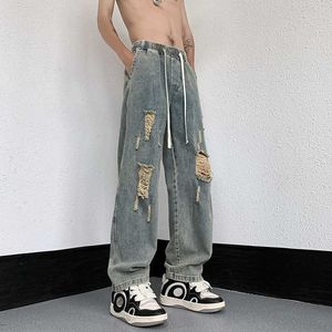 Męskie dżinsy Summer High Street Vibe Pants American Hip Hop Risped modny i przystojny