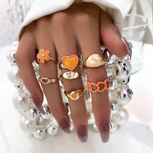 Orecchini pendenti 2024 Set di anelli a farfalla a cuore cavo Accessori per gioielli per feste con fiori che cadono olio arancione