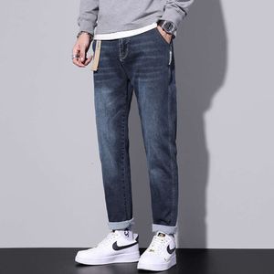 Herrfjäder och hösten trendiga märke tvättade retro raka ben jeans för mäns vår nya trendiga mäns casual byxor