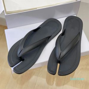 Gummi flip-flops för kvinnor semester kvinnors platt tofflor glida strand sandaler designer flip-flops promenad skor fabrikskor