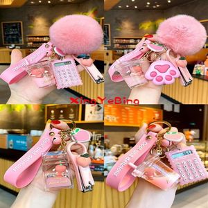 Keychains Creative Milk Bottle Crystal Keychain Cute Hairy Ball Flowing Liquid Key Chain Computer Nail Clipper Bag Pendant301f