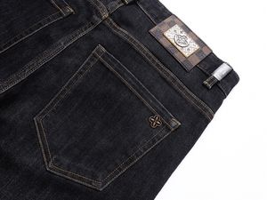 Herr jeans designer 23 vår/sommar ny broderi high end big cow smal fit rak ärm elastiska långa byxor tryckta
