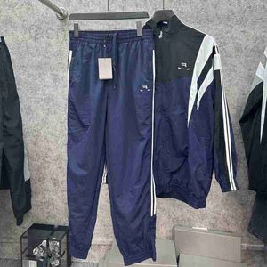 Men's Tracksuits Designer Logo Embroidered Spliced Contrast Sports School Uniform Jackets and Sprint Suits UF3K