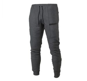 2019 Nuovi collant da corsa casual da uomo pantaloni da jogging pantaloni compressi palestra da uomo pantaloni da bodybuilding sport skinny legging abbigliamento sportivo lungo Trou8359257