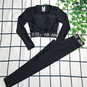 Black Active Sets tuta da yoga per pantaloni lunghi a maniche lunghe con logo per esercizi di serraggio della carne di fascia alta per esterni