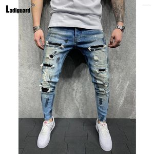 Erkek kot pantolon kesim denim pantolon erkekler rahat sıska demin sokak aşınma 2024 Avrupa ve Amerikan tarzı moda deliği yırtık pantolon