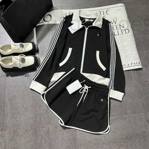 Herrspårar designer märke 2024 tidigt vår ny nanyou ce broderi färg kontrastpanel flip krage zipper jacka+shorts casual sport set 1W7G