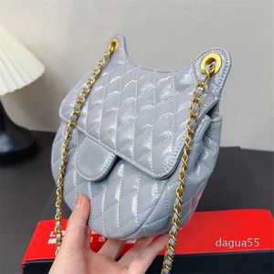 Moeda designer bolsa de ombro feminina clássico grande capacidade bolsa de couro axilas saco de metal ferragem corrente sela saco