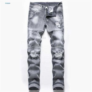 Jeans da uomo grigio chiaro con fori per uomo