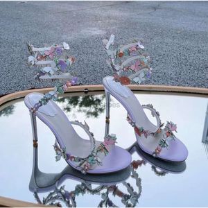 Rene Caovilla High Heel Sandals 나비 꽃 장식 9.5cm 여성 드레스 신발 뱀 래핑 발 반지 여름 오픈 발가락 진주 디자이너 공장 신발