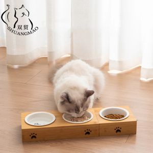 供給Shuangmao Pet Cat Feeder Ceramic for Dog Bowl for Double Mouth木製スタンドステンレス鋼給餌ボウル子猫犬製品