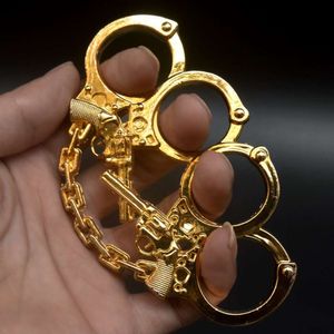 Affordable Fast Shipping Solid Limited Editon Fashion Multi-Function Outdoor Fist Ring Paperweight Hard Keychain Punching Wholesale 2 Gun Design