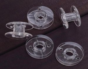 Ankomst 1000st Clear Plastic Empty Bobbins för bror Janome Singer Symaskiner KLÄDER Supply Top Notions4545090