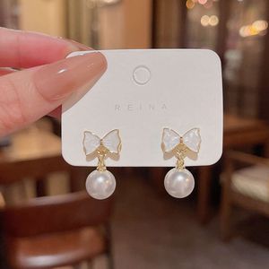 Sier Needle, Light , Small Popular Oil Dropping Bow Knot Female Ins Fashion, Versatile Temperament, Pearl Hanging Earrings, and Ornaments