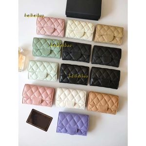 Kosmetiska väskor fall lyx 2024 modedesigner kvinnliga korthållare klassiska mönster kaviar lammskinn grossistkvinna liten mini plånbok ren färg sten kisel läder