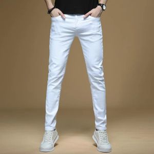 Брюки мужская корейская мода Soild White Jeans Broken Hole Маленькая нога Slim Fit Denim брюки бренд эластичная уличная одежда прямая брюки