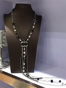 خريف وشتاء سلسلة سترة C Designer Necklace لسلاسل لؤلؤة السيدة العلامة التجارية Gold Crystal Jewelry Clclies Women Long Stain 212