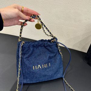 Mini 22 skräpväska 20 cm kvinnor denim diamantgitter lyxig handväska crossbody axelväska guld mynt söt underarmsäck trend mynt handväska band fanny pack nyckelpåse