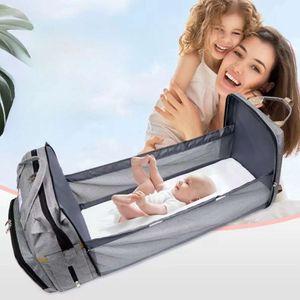 Designer baby blöja väska mamma påsar för babyväskor med basinet säng reser ryggsäck med spjälsäng vattentäta barnvagnsband H1110 grossist lätt att bära