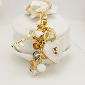 Clover Rhinestone Key Lock Lock Keychain Key Sparkle Key Ring Based حقيبة ظهر السيارة مفتاح سحر النساء عشاق عيد الحب هدية