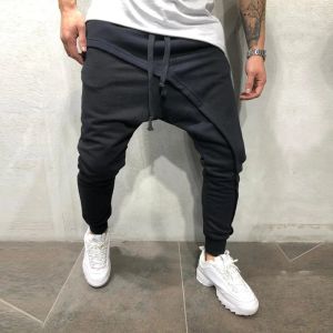 Pantaloni della tuta 2023 Pantaloni stile harem di moda da uomo Hip Hop Pantaloni casual Pantaloni sportivi elastici in vita Fitness Pantaloni streetwear maschili Pantaloni incrociati