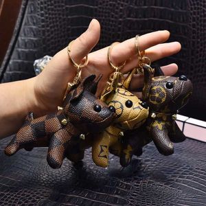 デザイナーカートゥーンアニマルスモールドッグクリエイティブキーチェーンアクセサリーキーリングPUレザーレターパターンカーキーチェーンジュエリーギフト6カラー