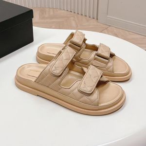 High quality designer sandals cowhide flat sandals Luxury women's buckle embellished sandals are backed by empty open-toed flip-flops