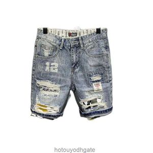 Mens Jeans grossist 2021 koreanska mode män avslappnad tiggare hål denim shorts märke tryckt lapp rippade korta byxor