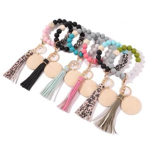 Chaveiros Mulheres Chaveiros Madeira Disco Em Branco Pulseira Chaveiro Titular Silicone Bead Tassel Pulseira Bangle Keychain249q