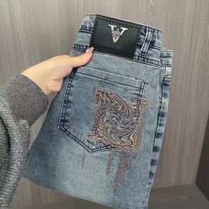 24ss Primavera / Verão Novos Jeans Masculinos e Femininos Designer de Moda Calças Tubo Reto Soltas Impressas Jeans Full Print Jacquard High Street Hip Hop Calças