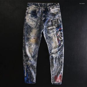 Мужские джинсы Street Hole Patch Print Ink Splash Тонкие маленькие ноги Череп Краска Европейские и американские индивидуальные брюки