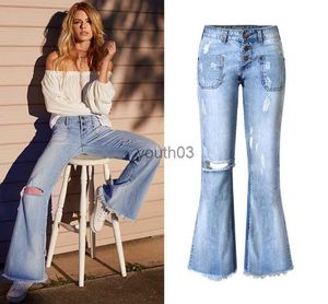 Damen Jeans Großhandel-Damen Jeans Ripped Hole Quaste Tasche Knopf Bein Luxus Mode Punk Blue Jeans für Frau gute Qualität 240304