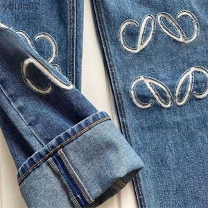 Women's Jeans Designers Womens Jeans Arrivals High Waist Street Hollowed Out Patch Embroidered Decoration Pants Brand Warm Loewee Purple Jeans 240304