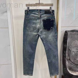 Herr jeans designer mäns jeans tryckta klistermärken anpassade bokstav vintage tvätt lös stretch rak slitage resistent topp rad patch casual byxor 4ooy