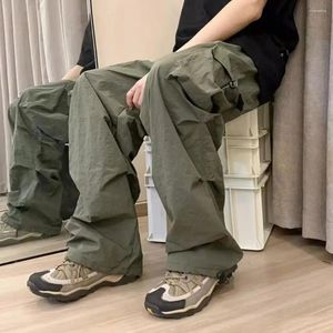 Pantaloni da uomo tinta unita cargo elegante con tasche multiple vestibilità ampia vita elastica streetwear alla moda per l'hip hop