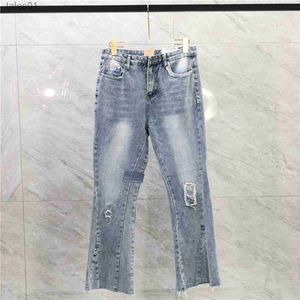 Jeans da donna Designer donna Jeans Distressed Biker Fit Moto Denim Moda uomo Jean Traforato Patch Piedi larghi Micro Flare Jeans 240304