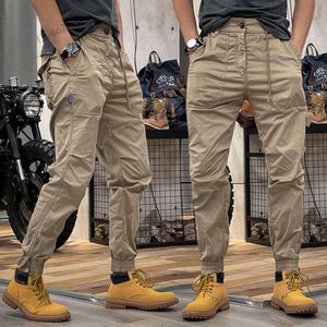 Wiosna i jesień Nowe spodnie ładunkowe Spodnie Casual Pants Elastyczne talia Multi kieszeni luźne luźne luźne męskie legiki designerskie trend mody