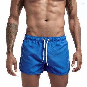 Shorts Masculinos Calças De Praia Bolso Embelezar Poliéster Secagem Rápida Juventude Cor Sólida Esportes Casuais De Três Pontos