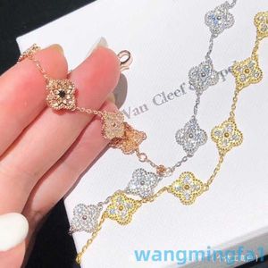 2024 Jewelry Designer Brand Vanl Cleefl Arpelsfour Leaf Gräs Sex blomma inlagd med full diamant tjock pläterad V 18K Gold Light Fashion Classic Armband