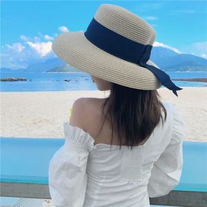 YMSAID Women's Sun Summer Beach Straw Women Boater Hat With Ribbon Tie för semester Holiday Audrey Hepburn Y200602273O