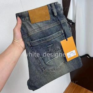 Europeiska jeansdesigner jeans för mens mager mode motorcykelbyxor tvättar elastiska smala passformade små ben lyxbyxor varumärke jeans