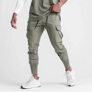 Byxor jogger mäns byxor tunna leggings snabb torkade svettbyxor mode gata klänning casual byxor multi ficka dragkedja arbetskläder byxor