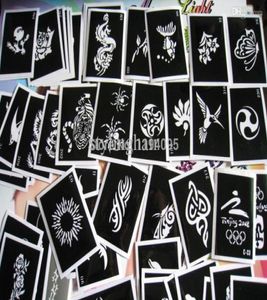 Whole 100pcslot Mixed tattoo stencil for painting henna tattoo pictures designs reusable airbrush tattoo stencil9632045