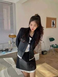 designer Shenzhen Nanyou High end MIU Home Commuting Versatile Fashion minimalist Style Black and White Contrast Suit Half Skirt Set GGI2