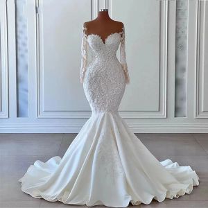 Splendido abito da sposa a sirena 2024 Collo trasparente maniche lunghe Perline di pizzo Abiti da festa da sposa Abiti su misura Abiti da Noiva Robe De Mariee